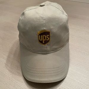 UPS Baseball Cap with UPS Brown and Gold logo. Adjustable.